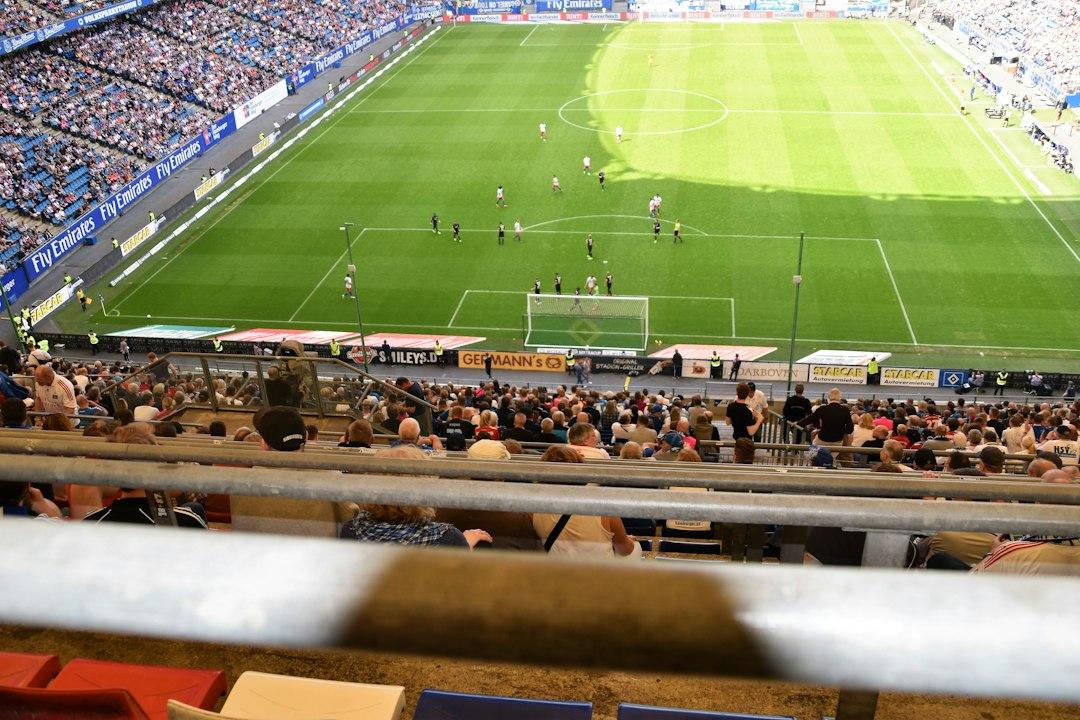 Aerial view of a packed football stadium during a match