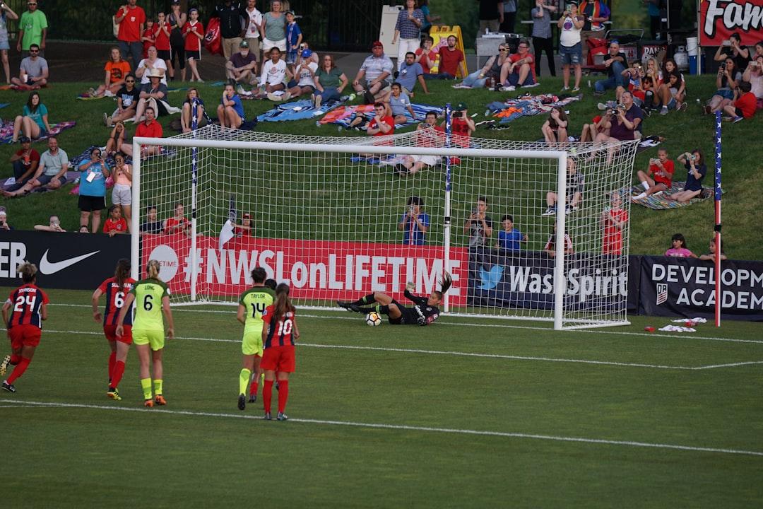 Strikers waiting near the goal during a football match