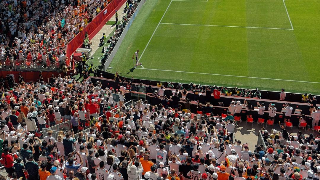Overhead view of a football stadium filled with fans.