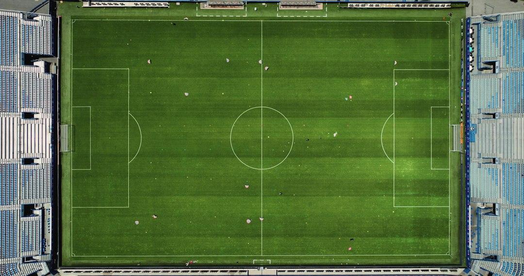 An aerial view of a soccer field in a stadium
