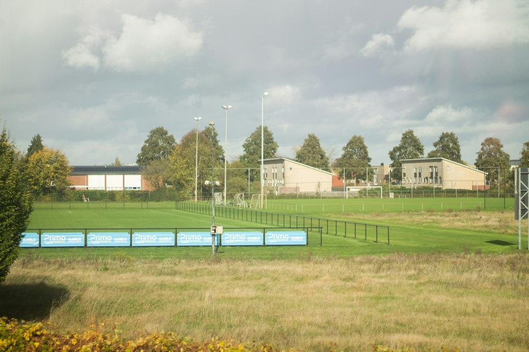 A stadium pitch viewed from the stands ahead of kickoff