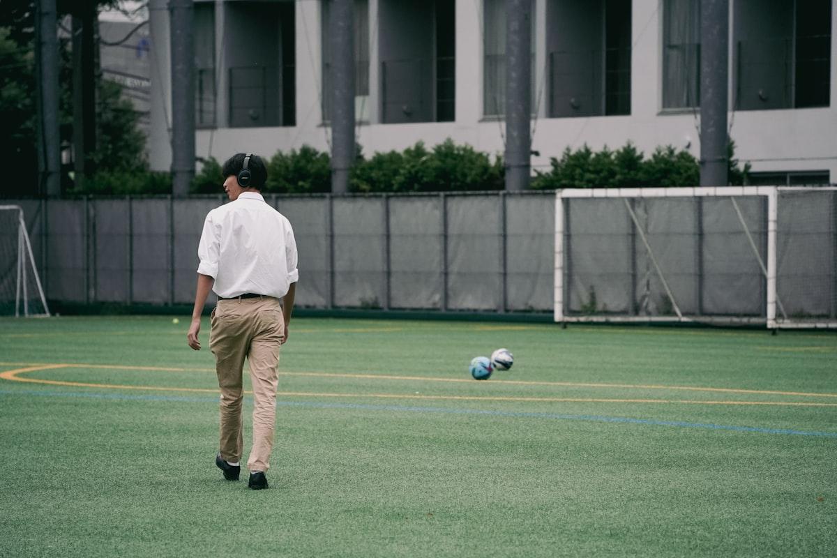 A match official in action during a soccer game