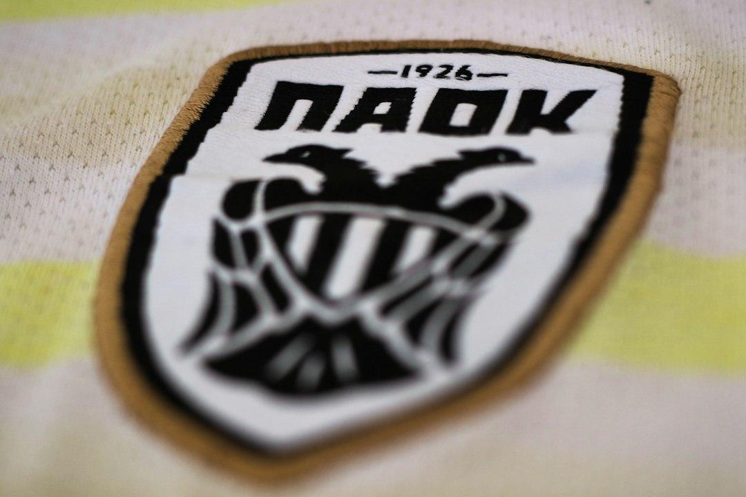 A close-up of a football shirt badge