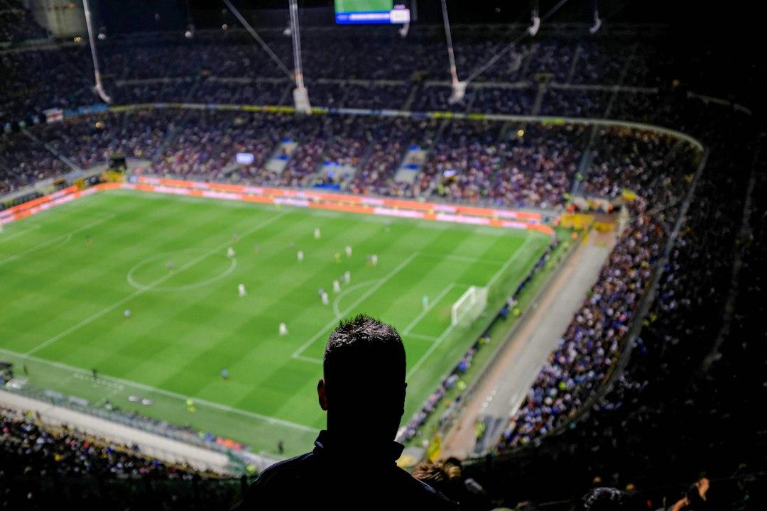 A packed football stadium on matchday