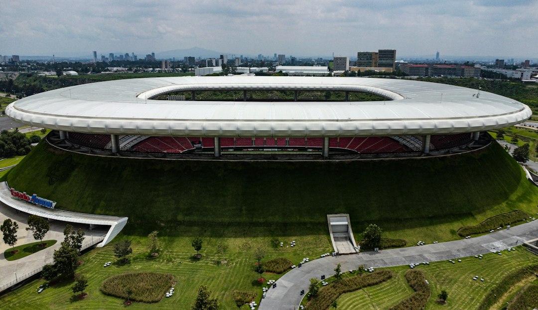 An aerial view of a soccer stadium in a city