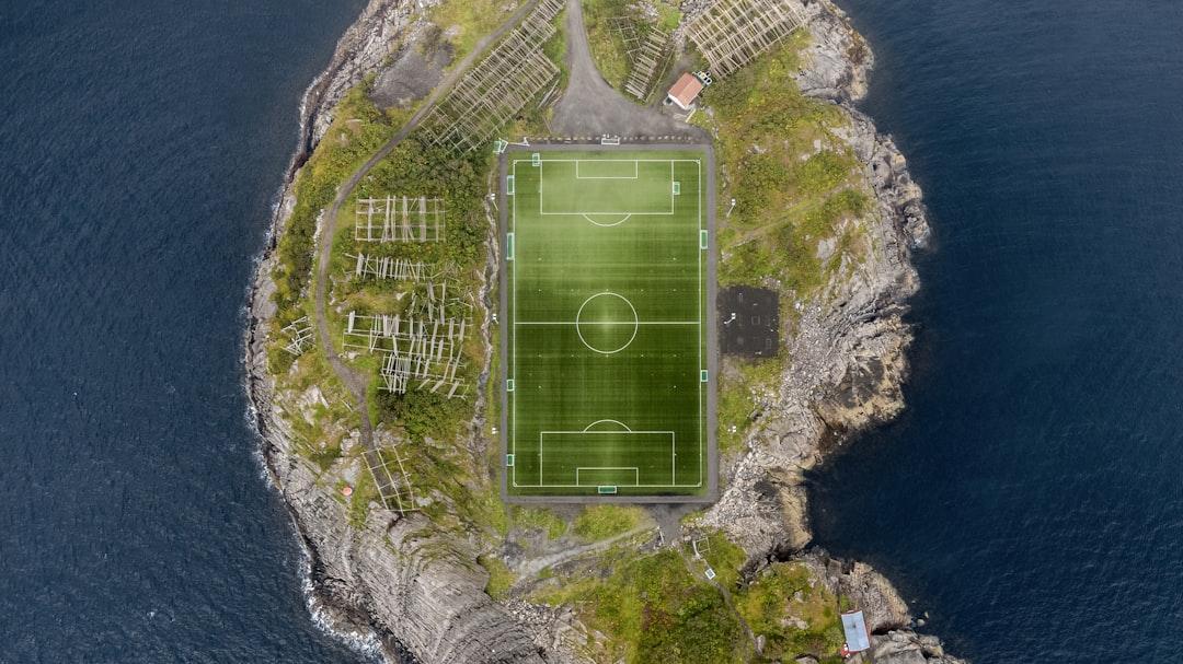 An aerial view of a soccer pitch showing space on the flanks