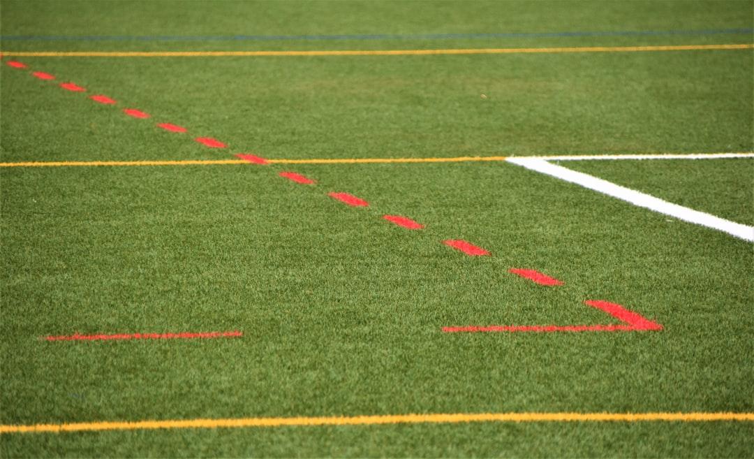 A football pitch with painted lines, where offside position is judged