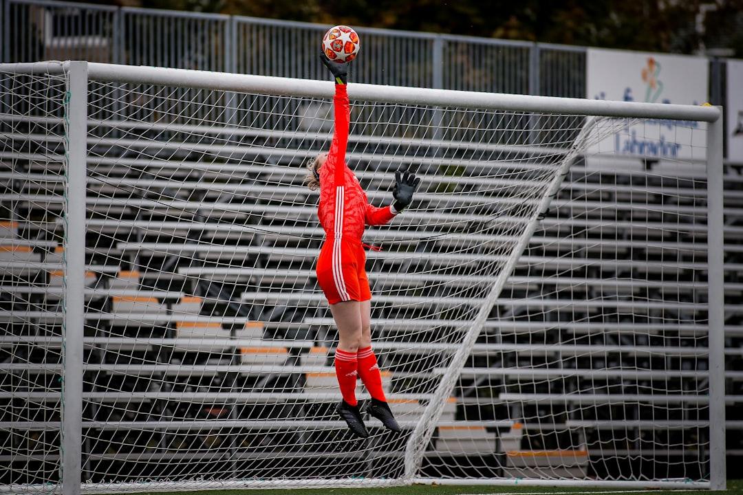 A soccer player in a red jersey ahead of kick-off