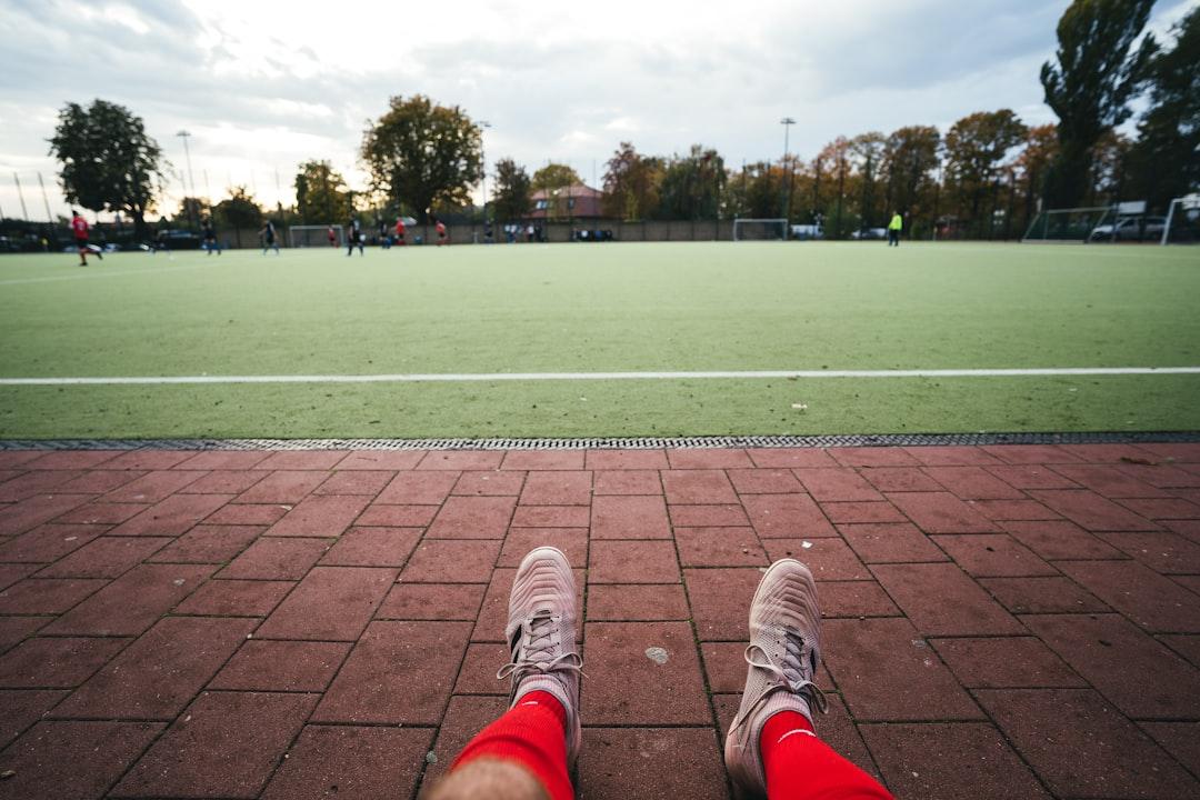 A player kitted out in long football socks on the pitch